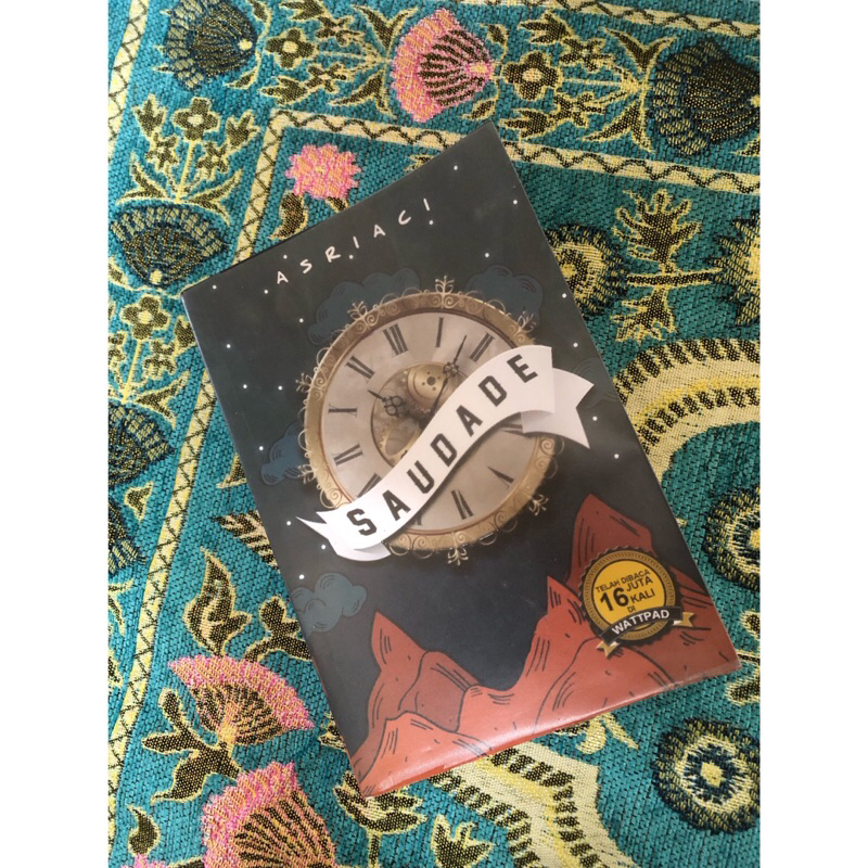 [Preloved] Buku Novel Wattpad “SAUDADE” — by Asriaci