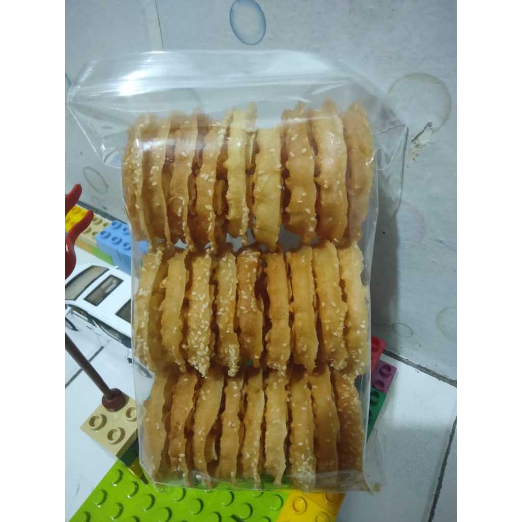 

KUE KERIPIK KRIPIK KEMBANG GOYANG WIJEN MANIS KHAS BETAWI 250GR 250 GR