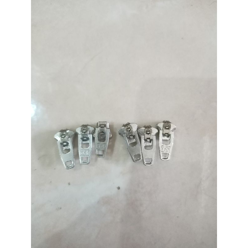kepala resleting celana jeans no4,5silver YKK(harga 10pcs)