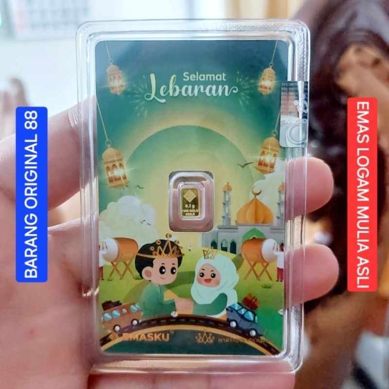 HADIAH LEBARAN KADO UCAPAN SELAMAT IDUL FITRI EMAS 0.1 GRAM ANTAM 0,1 LOGAM MULIA FOTO PASANGAN SUAM