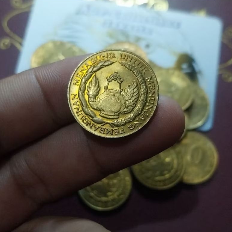 Koin 10 rupiah tabanas kuning tahun 1974