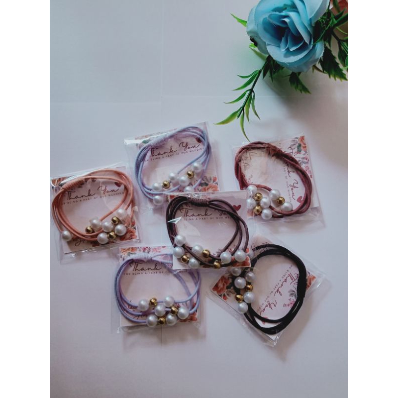 Souvenir pernikahan ikat rambut mutiara pita korean style unik dan elegan