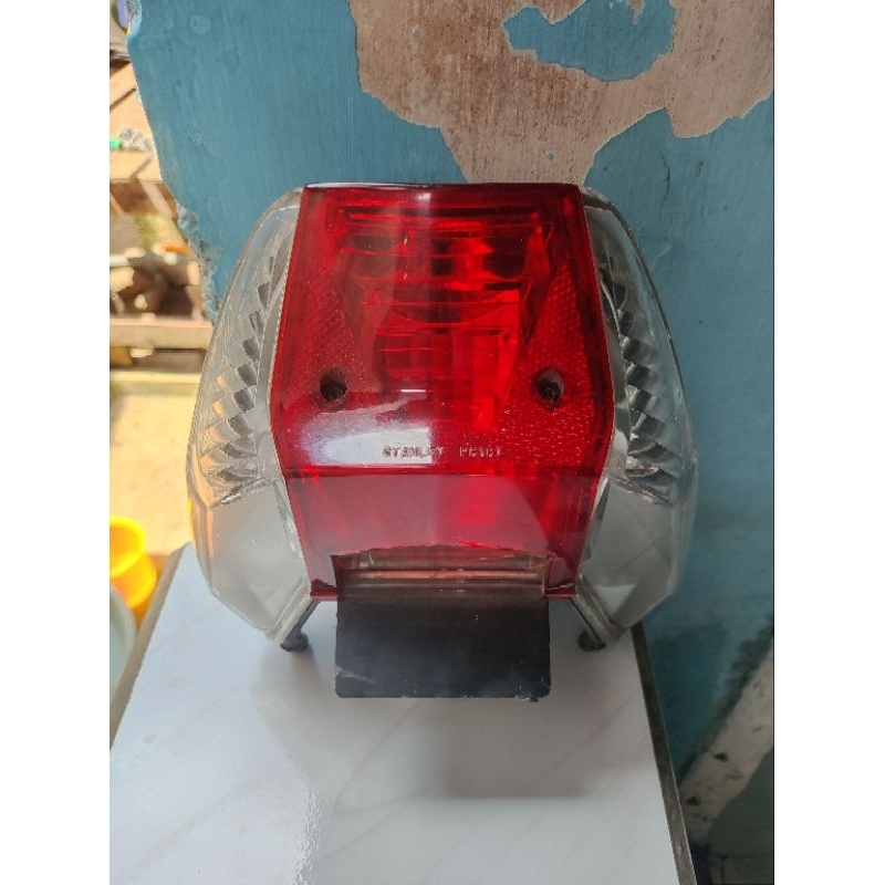 reflektor belakang supra x 125 ori copotan stanley