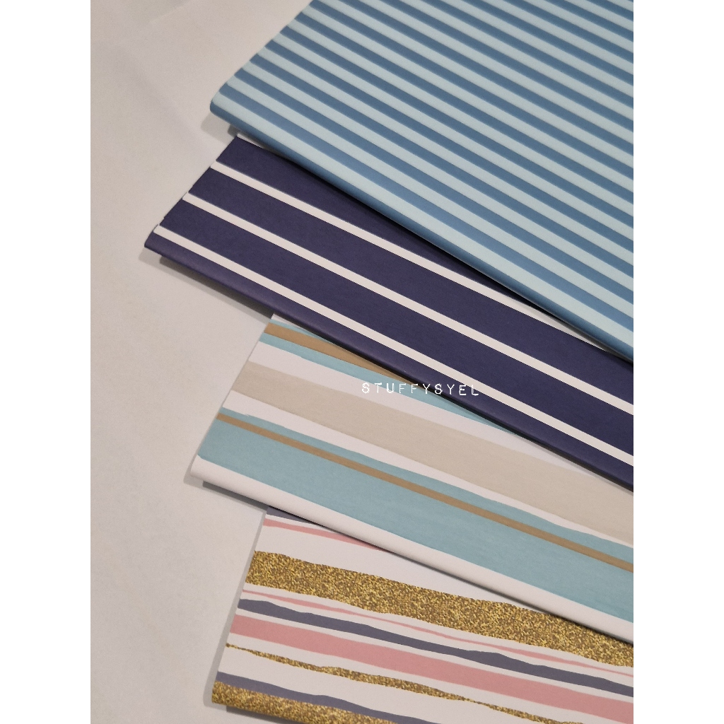 

Kertas kado motif garis bisa untuk sampul