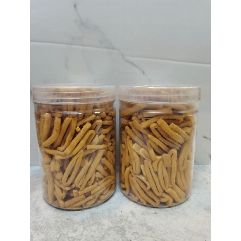 

cemilan stik jarum toples 300gram / Pangsit Lipat