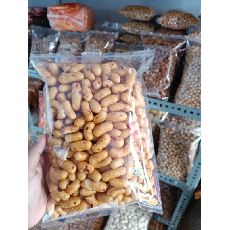 

Cemilan Pilus Ikan Rasa Pedas Kemasan 250gram