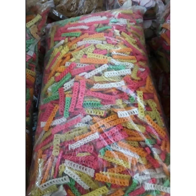 

KERUPUK TAORO WARNA WARNI PANJANG LUNTIR MURAH MENTAH TERLARIS BISA COD 500 gram