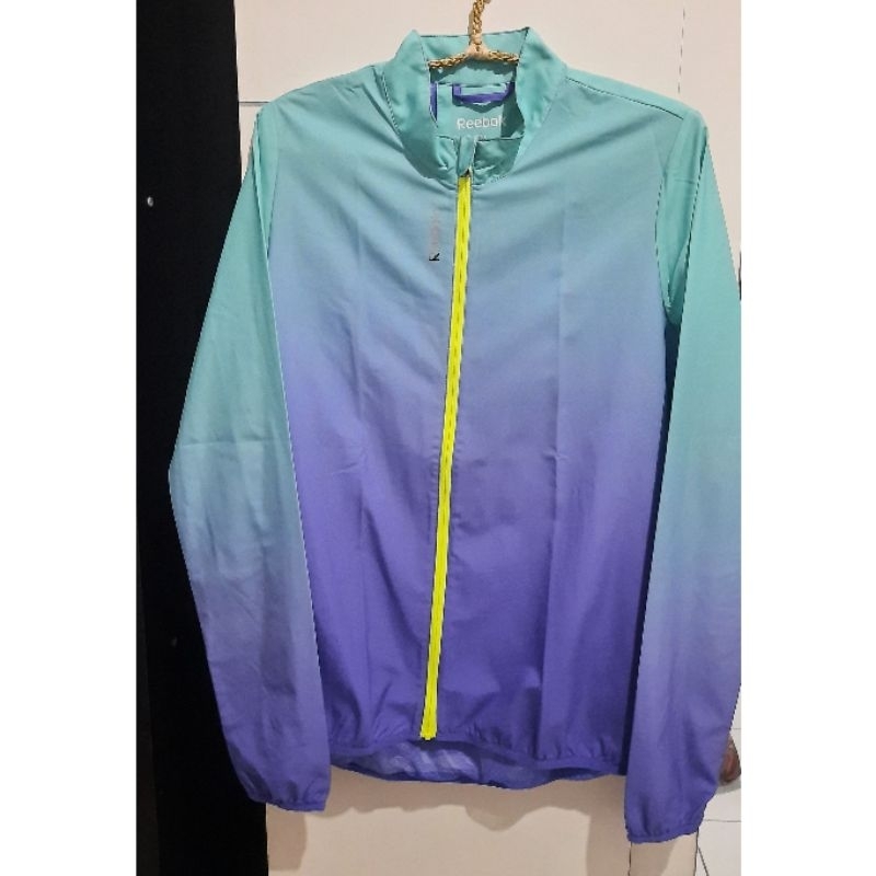 Preloved - Jaket running wanita Reebok