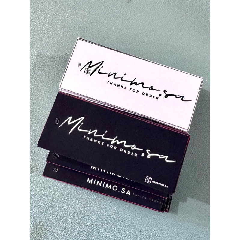 

Hangtag baju atau celana dengan tali