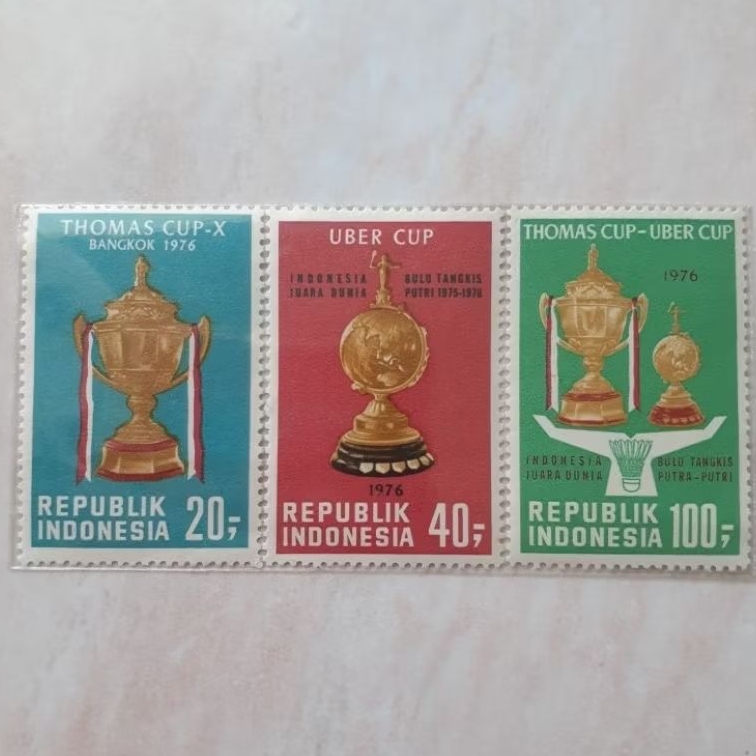 

(A) Perangko Indonesia - Indonesia Juara Dunia Bulu Tangkis Putra-Putri Tahun 1976 set lengkap 3pcs