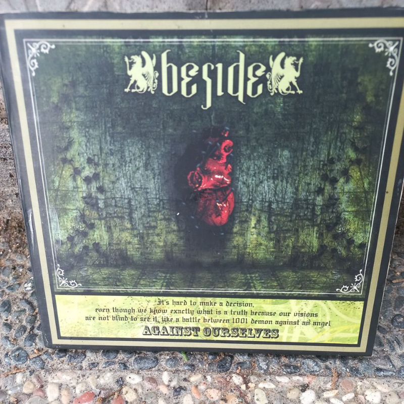 cd beside  - againts ourselves