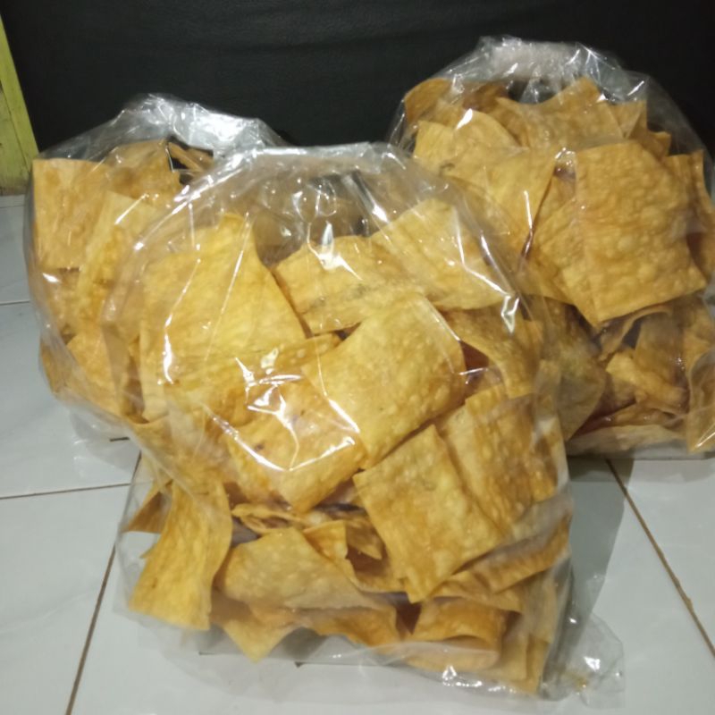 

KRIPIK PANGSIT GORENG KEMASAN ½KG GURIH DAN RENYAH