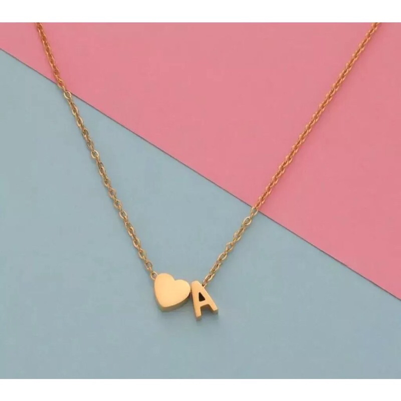 Kalung titanium huruf love