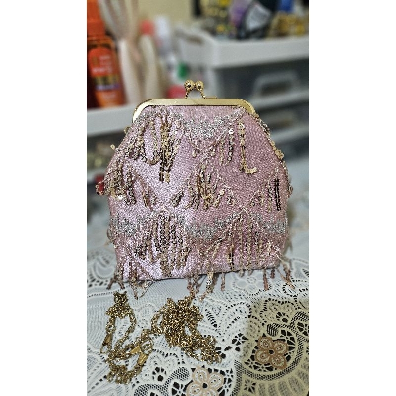 preloved waiwai clutch