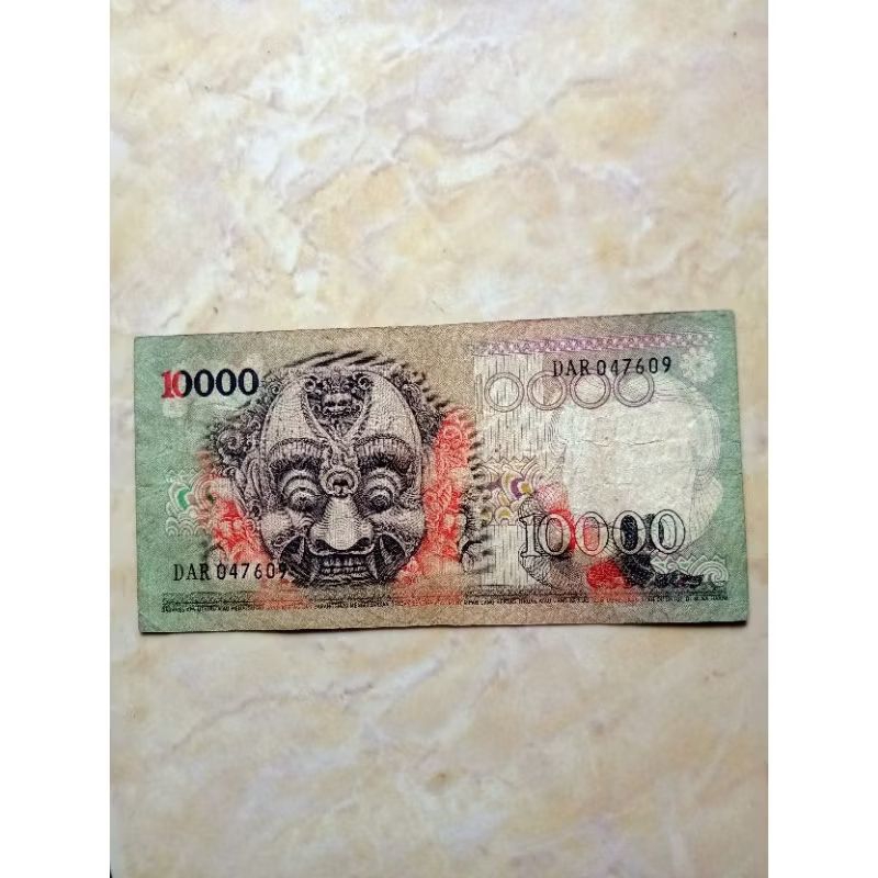uang pecahan 10ribu barong 1975 cukup langka desai uang terbaik sedunia pada masanya