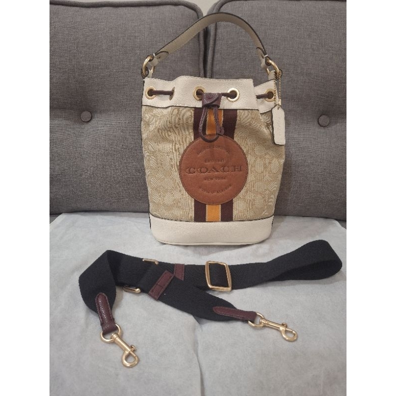 Preloved Coach Dempsey Drawstring Bucket Bag (Chalk / Light Khaki)