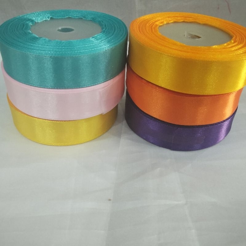 

(PER ROL)pita saten kain 3/4 inch (Lebar 2 cm)isi 20yard