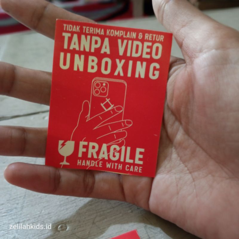 

Stiker video unboxing paket