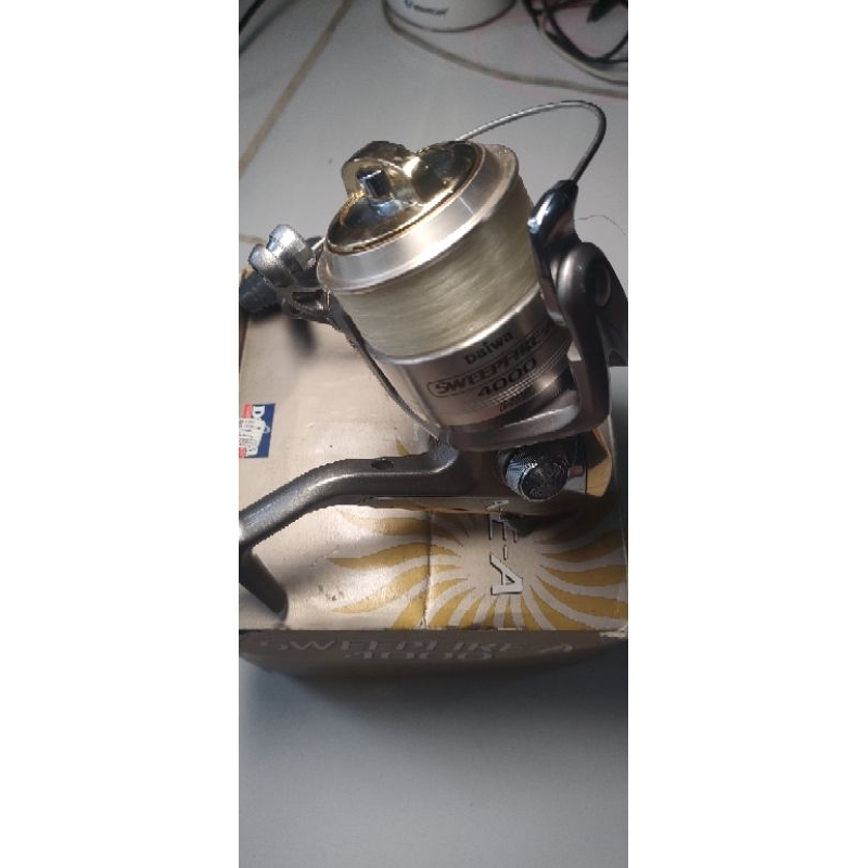 Reel pancing daiwa sweepfire -A 4000