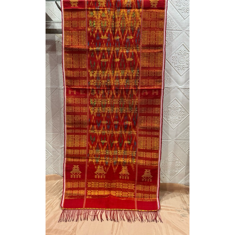 uis nipes rumah adat