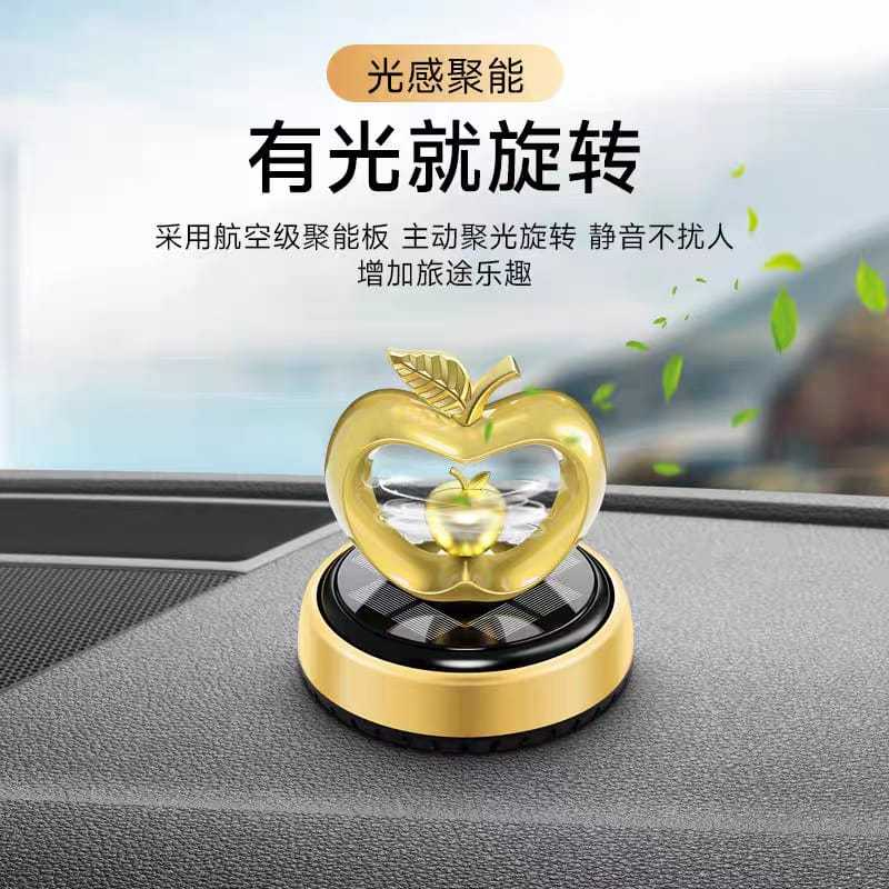 Parfum pajangan dashboard mobil motif Apple putar tenaga surya - Car ( Sukses )
