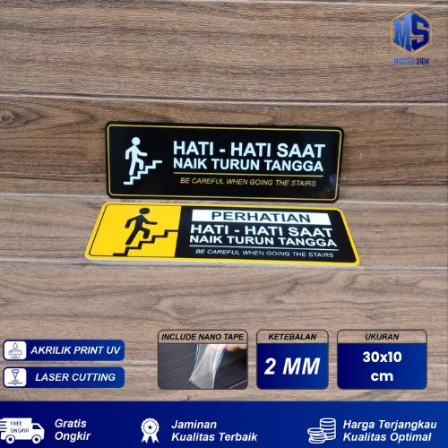Signage Hati Hati Naik Turun Tangga
