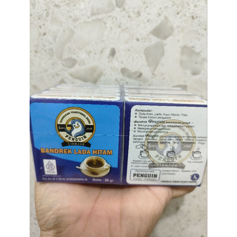

Bandrek Lada Hitam Penguin Kemasan 1 Pack isi 10 Bungkus