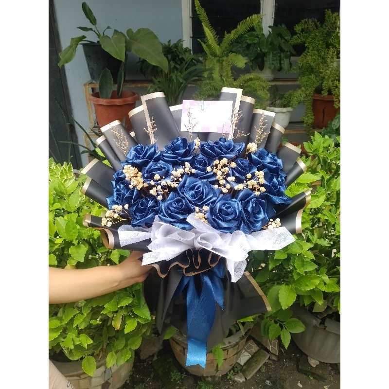 

Buket Bunga Pita Satin 15 Kuntum Mix Baby breath Caspea