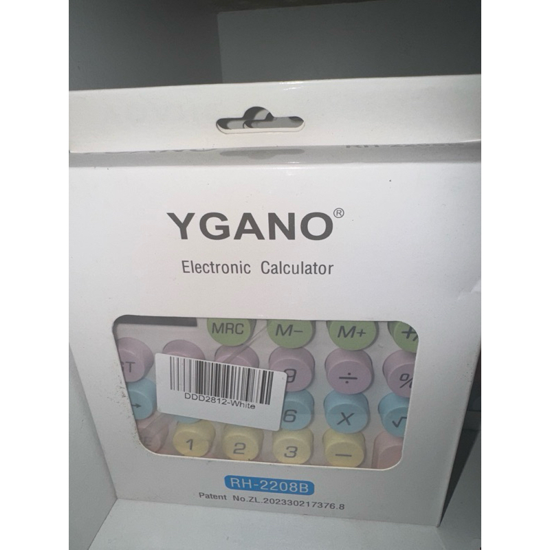 

kalkulator putih ygano besar