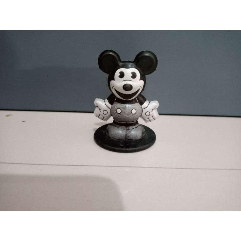 black and white Mickey Mouse figurine
