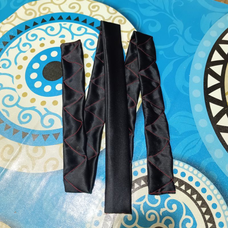 ikat pinggang tunggal buatan nini imay dalam pagar