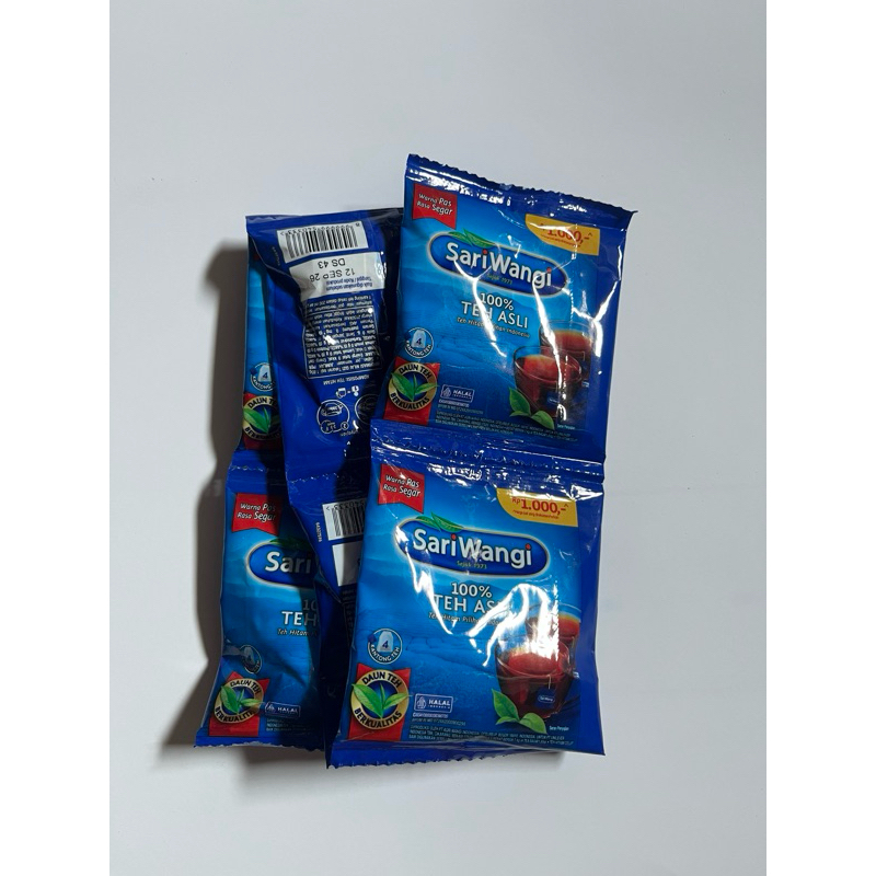 

sari wangi teh asli kemasan sachet 1 renteng isi 6sachet