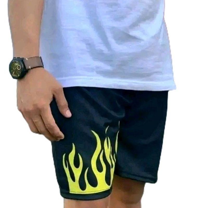 celana pendek pria motif api