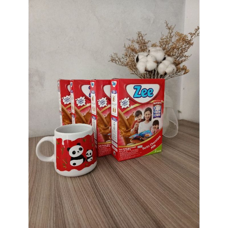 

Pembelian 4 box. free gimmic/ Zee reguler Swizz Chocolate milk 340g /