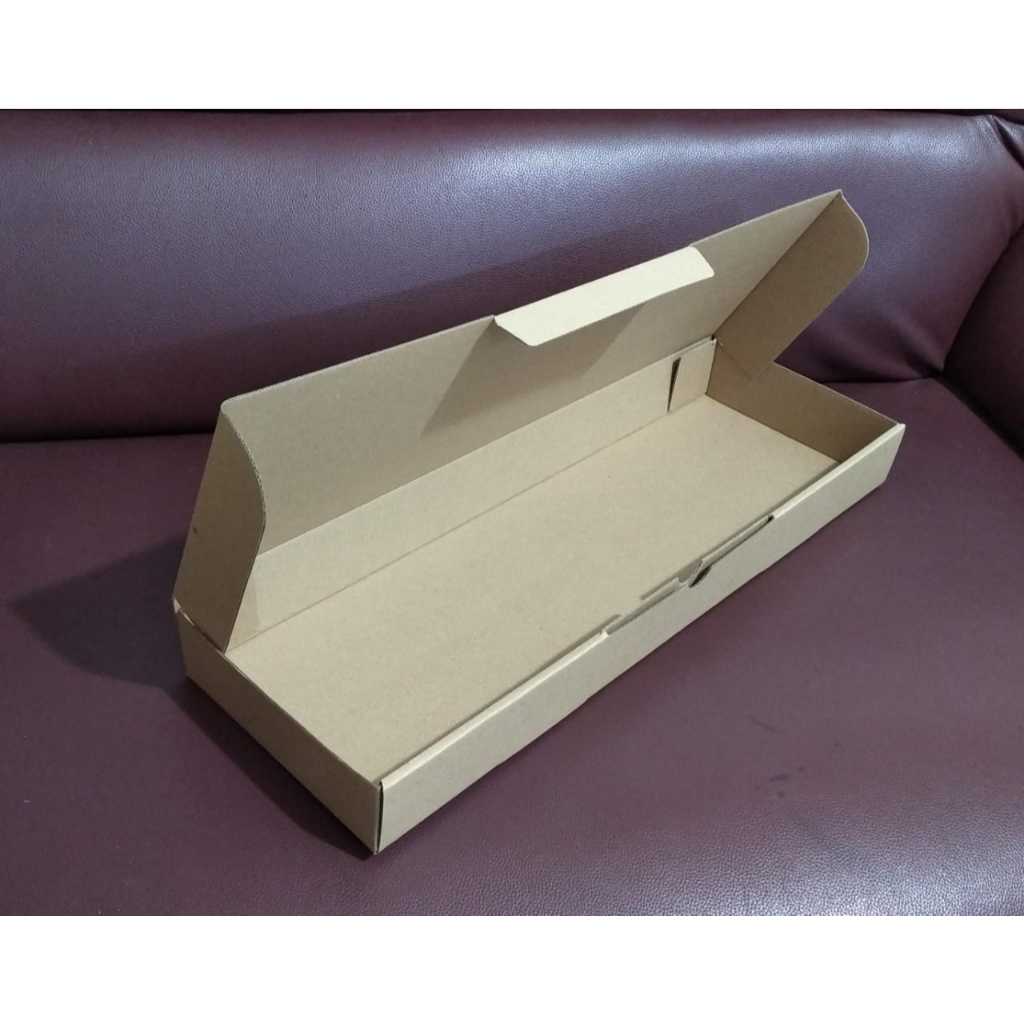 

Kardus Packing Die Cut ukuran 58x30x6