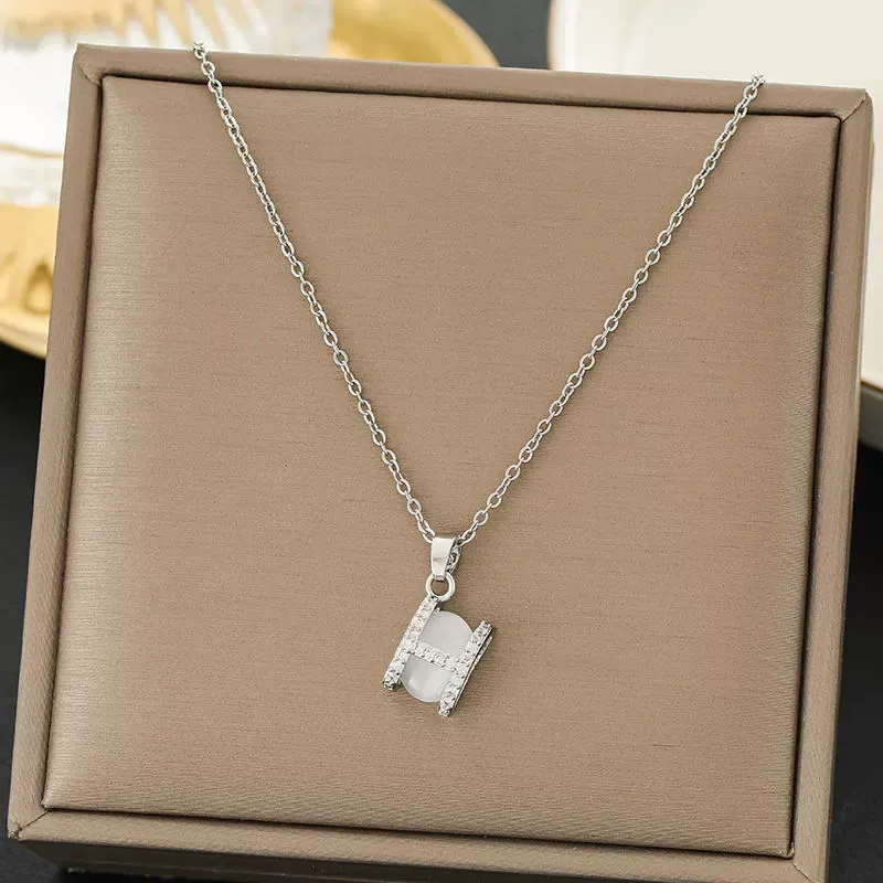 Kalung Titanium Warna Silver Wanita H Batu Giok Putih PTK-91