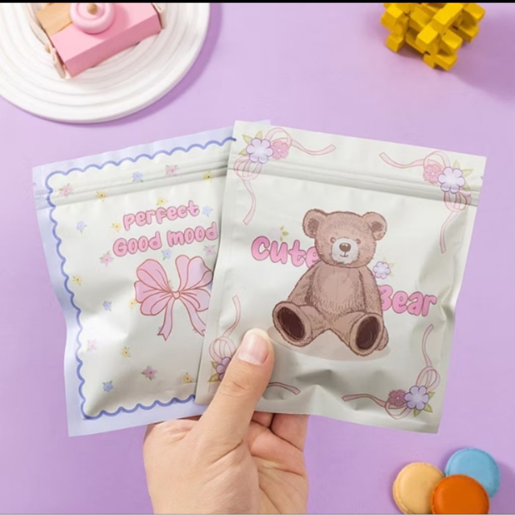 

POUCH SEAL SERBAGUNA GAMBAR PITA UKURAN 13X15 COCOK UNTUK SIMPAN ASESORIS