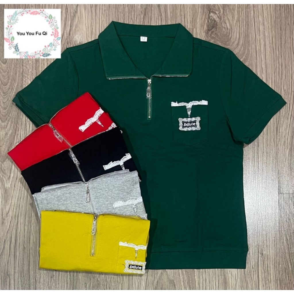 Atasan Kaos Premium Wanita ( Model Zipper, depan Kantong, Lengan Kanan ada fantasi)