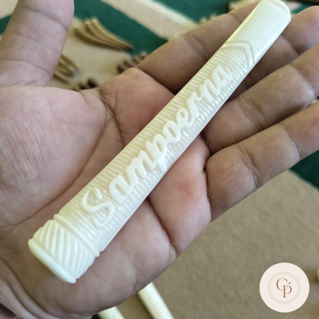 padutan once pipa tulang ukir