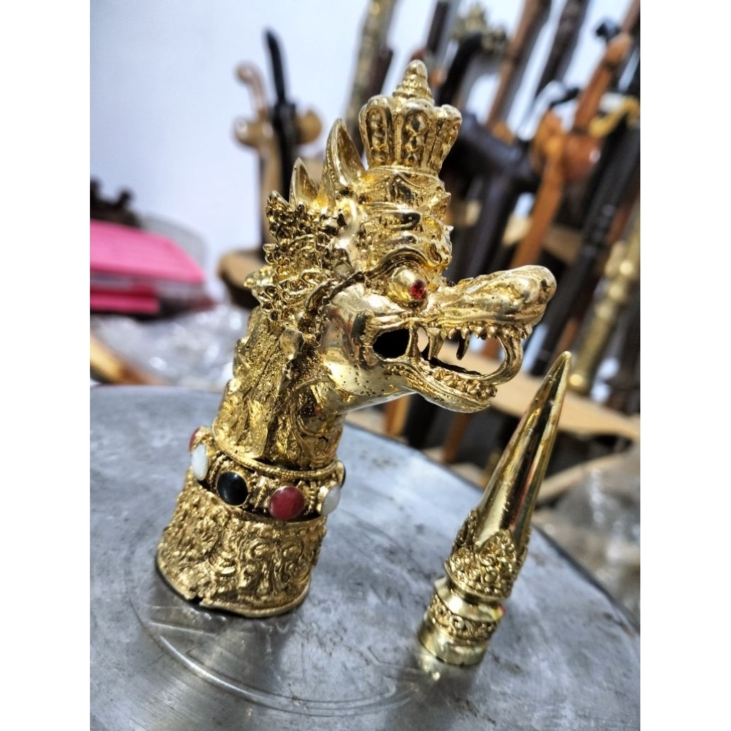 ornamen tongkat komando Wesi kuning kepala naga kencana