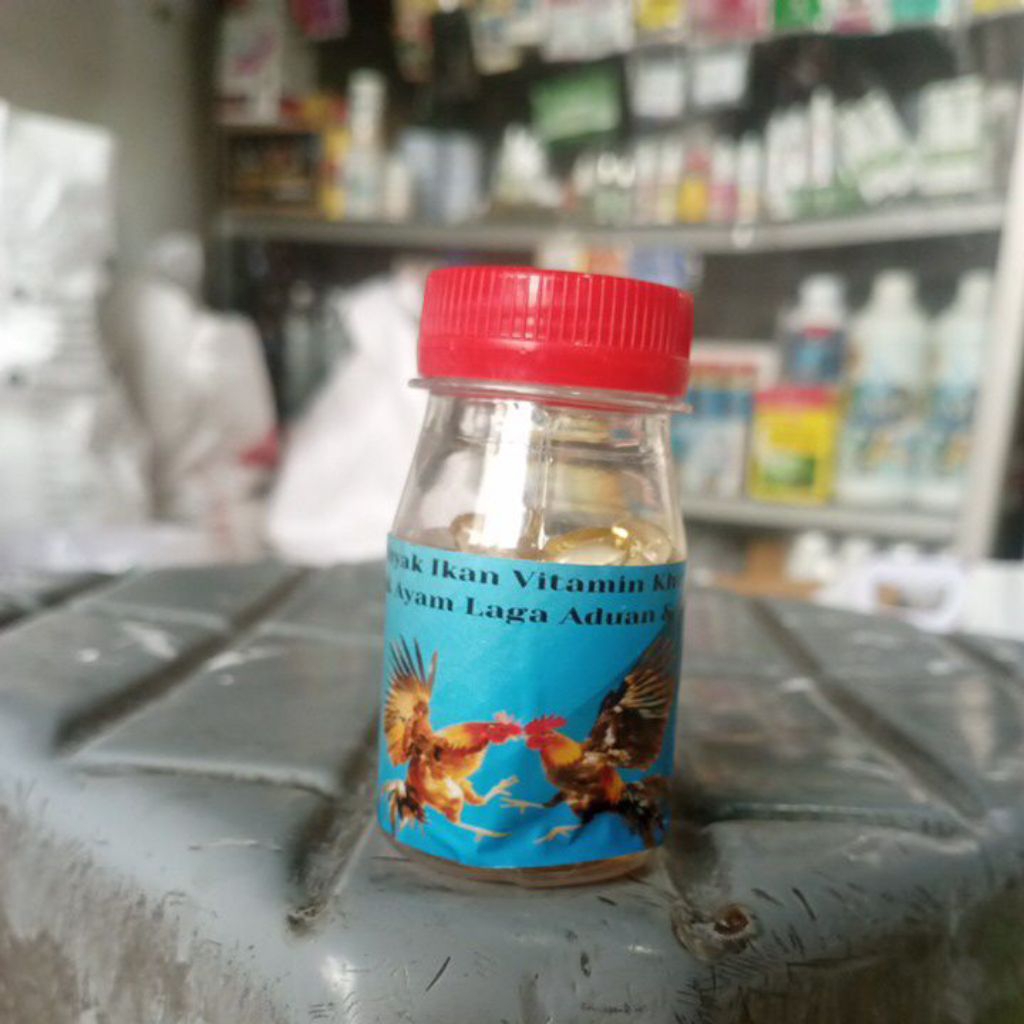 MINYAK IKAN VITAMIN KHUSUS UNTUK AYAM LAGA ADUAN DAN TERNAK