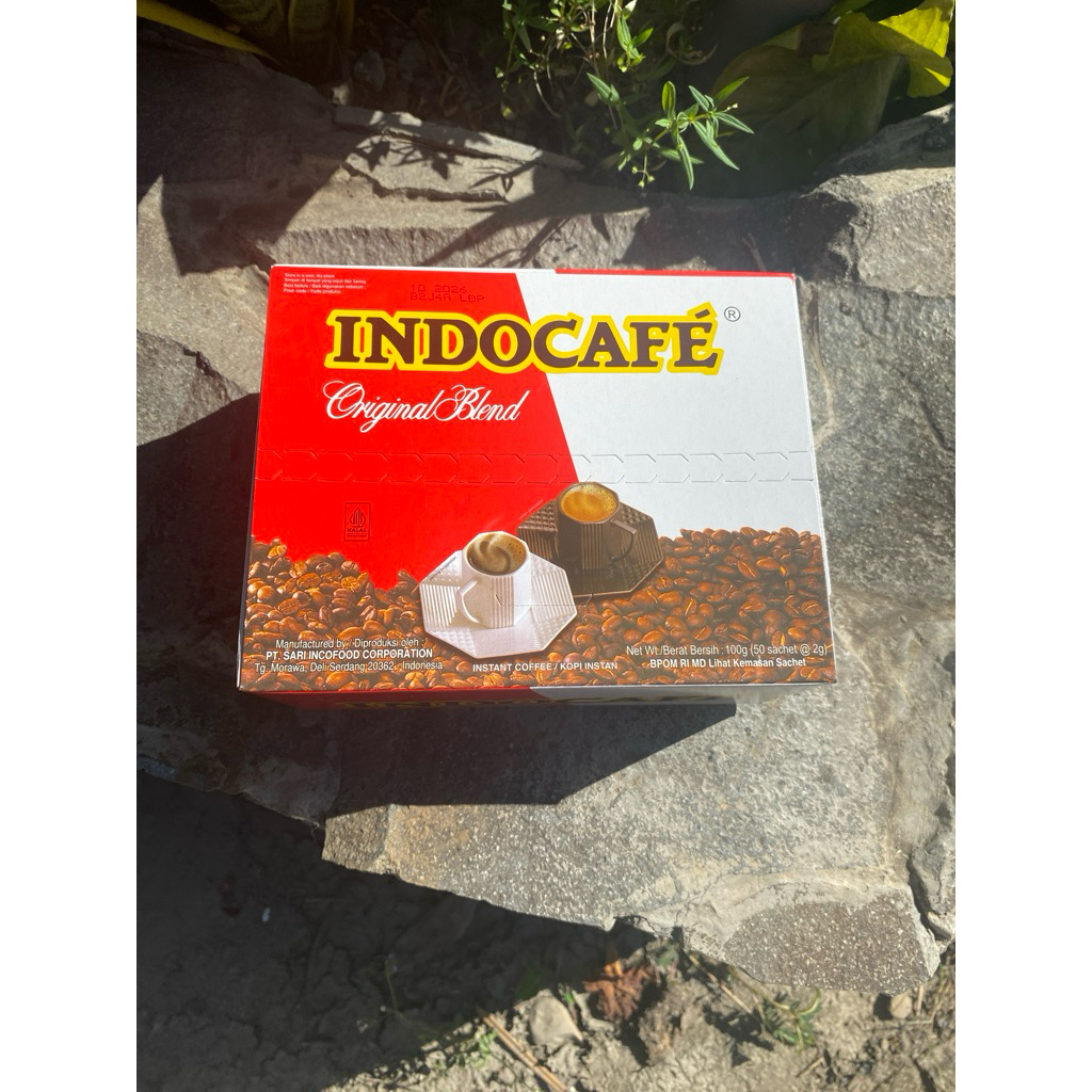 

INDOCAFE ORIGINAL BLEND KOPI INSTAN BERAT BERSIH : 100g (50 sachet @ 2g)