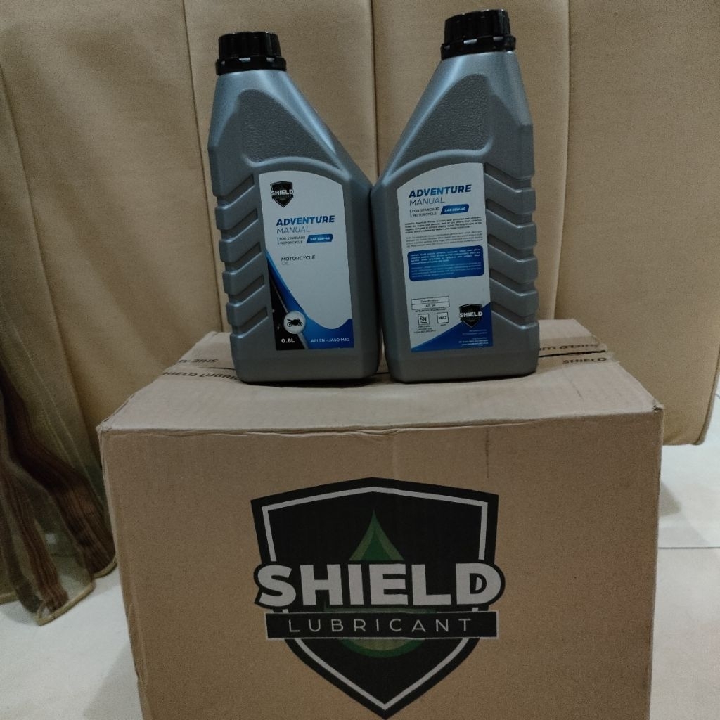 oli Motor Manual SHIELD adventure SAE10W-40 ( harga 1dus 12pcs ,0.8L )