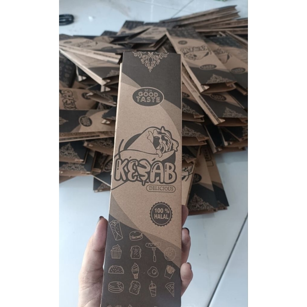 

KEMASAN KEBAB HARGA EKONOMIS KUALITAS PREMIUM ISI 100 PCS SIZE 27*7*4 CM TERBAIK KOTAK KERTAS KEBAB