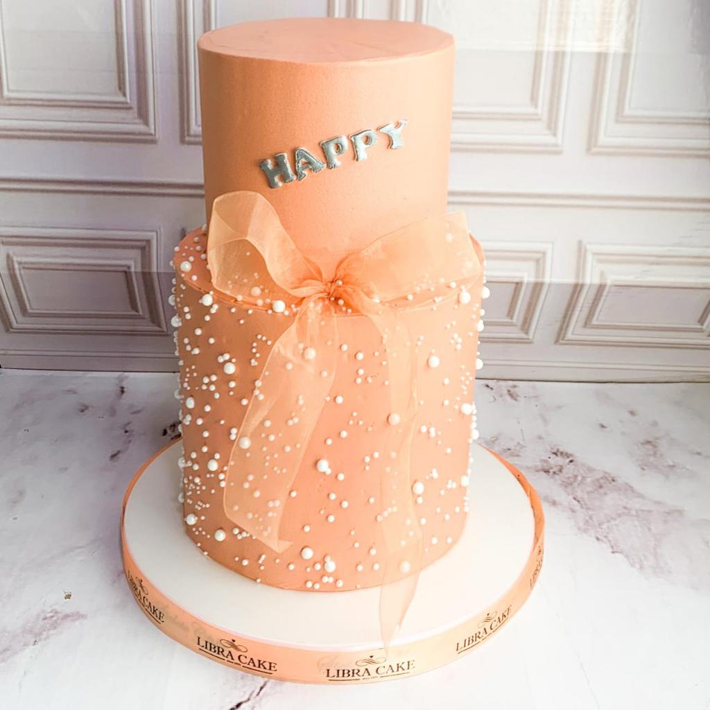

Kue Ulang Tahun/Birthday Cake/Kue Ultah tema Ribbon Pink/cake 2 Tier Pink