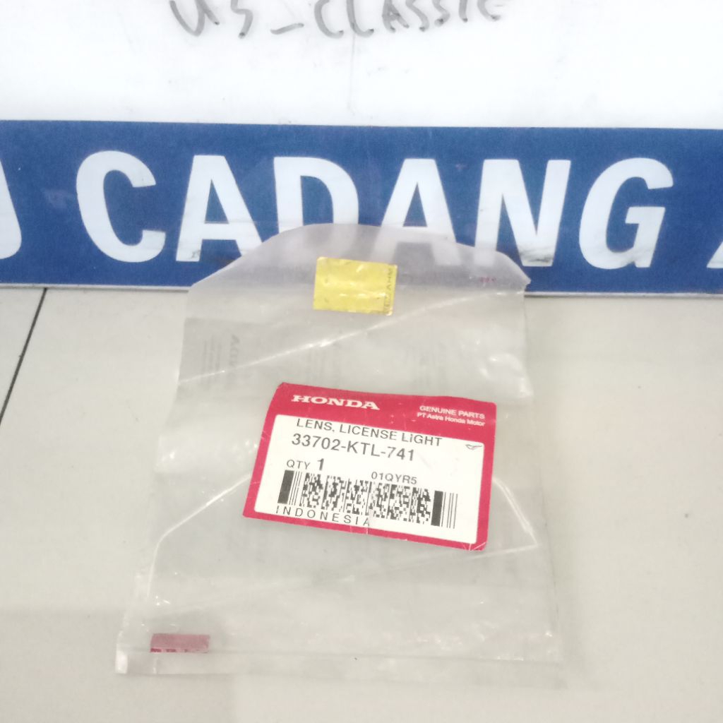 33702KTL741 Lens License Light Mika Kaca Lampu Bagian Bawah Stoplamp Honda Supra Fit New Original AH