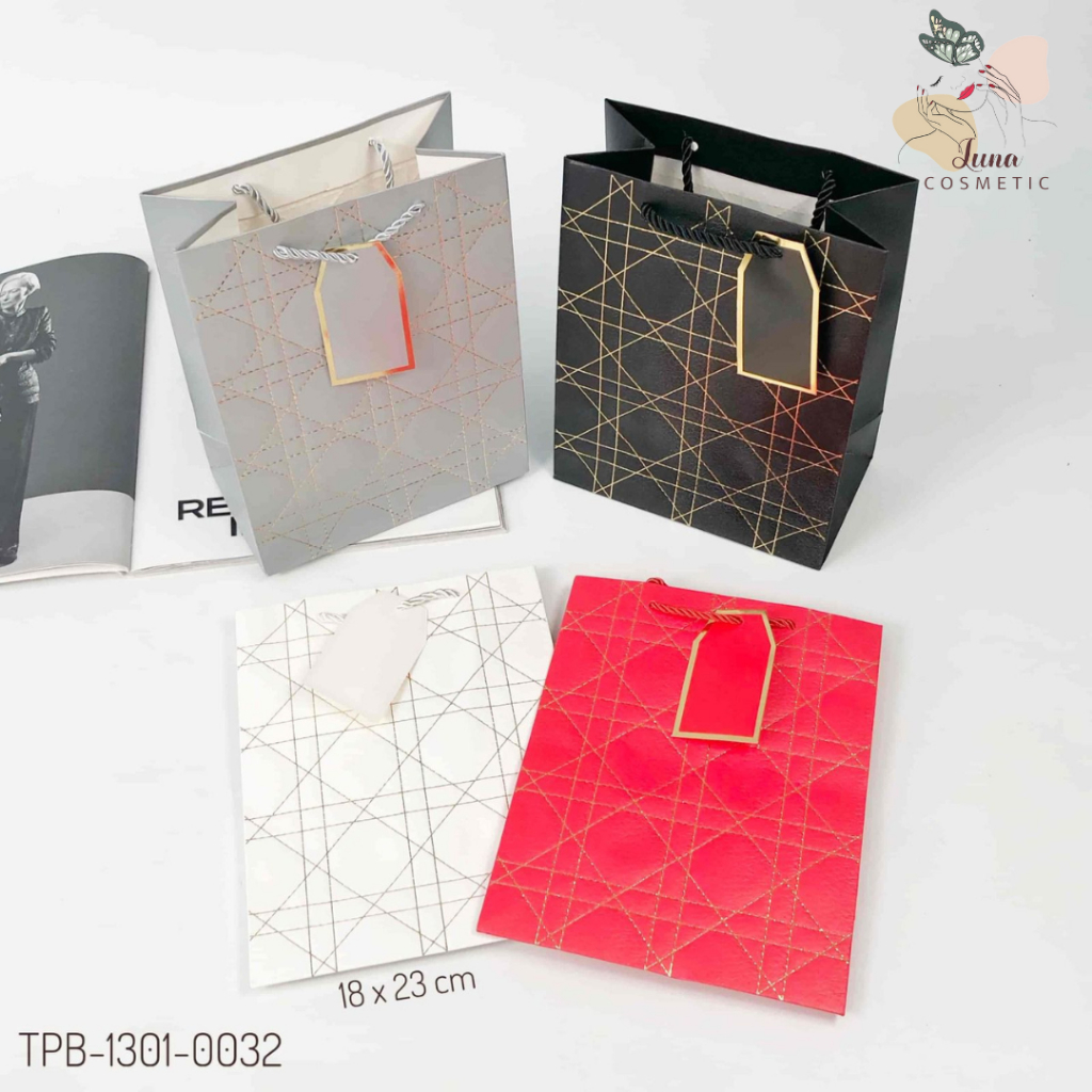 

LUNA-TSJ-TAS PAPERBAG PORTRAIT UK 18X10X23 MTF KTK SQUARE MIX