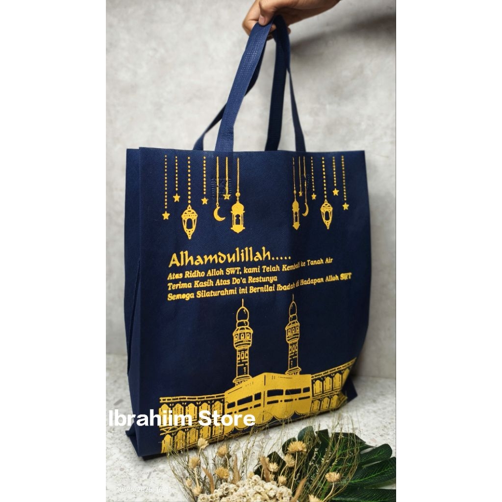 

(ISI 12 PCS) TAS HAMPERS HAJI DAN UMROH / GOODIE BAG HAJI / GOODIE BAG UMROH / TAS OLEH-OLEH HAJI DAN UMROH SPUNBOND MURAH