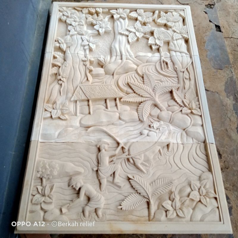 ukir batu hiasan dinding