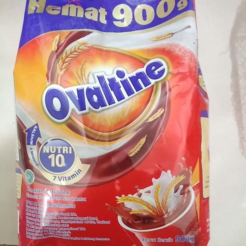 

Ovaltine Hemat 900g. Chocolate Malt Drink. Minuman Serbuk Malt dan Cokelat. NUTRI 10. KALSIUM, 2 Mineral & 7 Vitamin. Berat Bersih 900g.